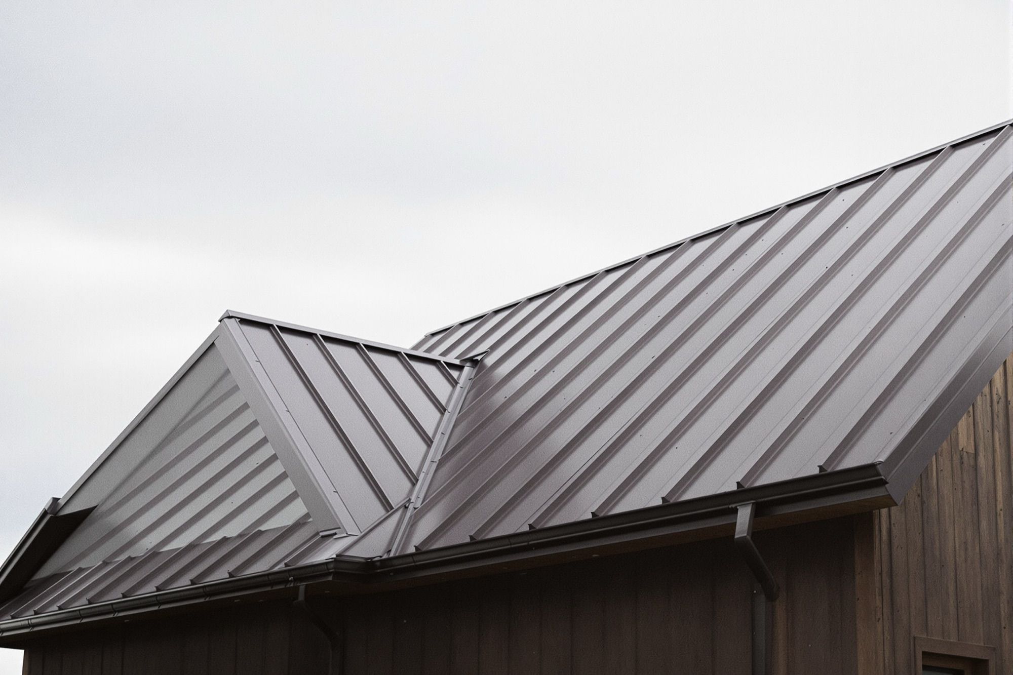 Dark bronze standing seam metal roof